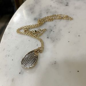 Gold Plated Necklace with Silver Detailing Pendant.